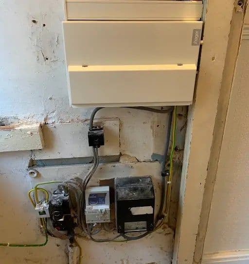New consumer unit fitted above the incoming supply during a fuse box upgrade